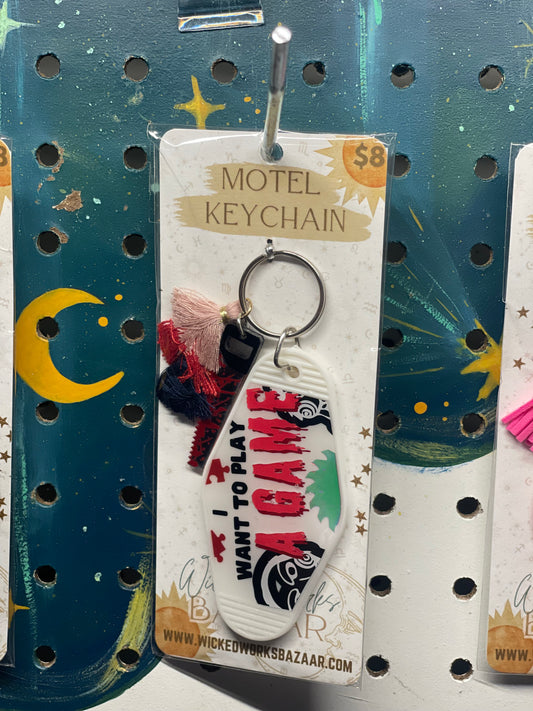 Play a Game - Motel Keychain